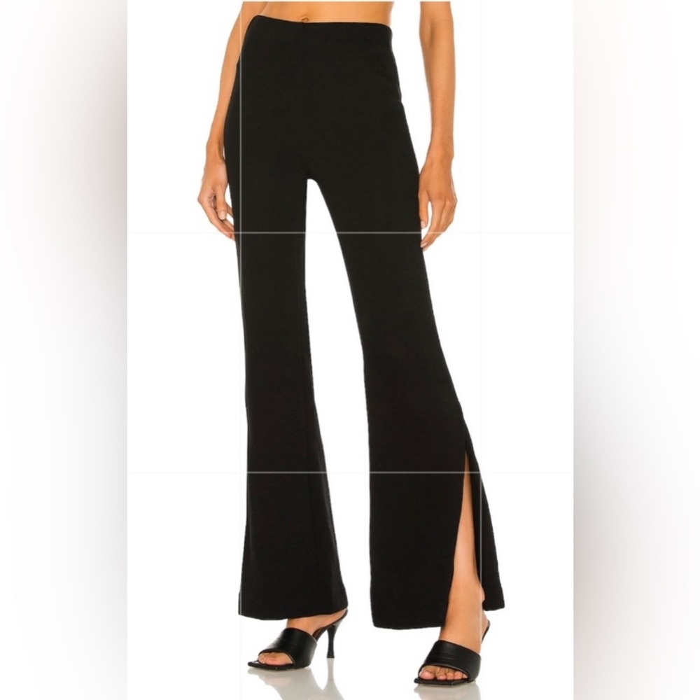 Lovers and Friends black side slit leg. SZ Med(6-8) NWT never worn.